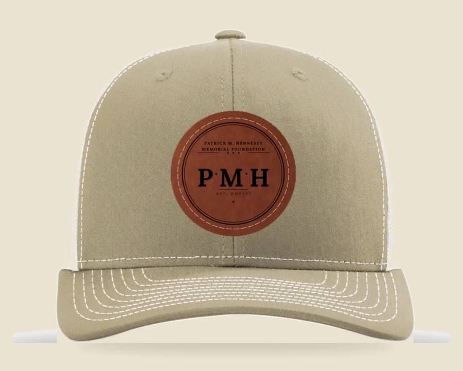 PMH trucker cap — khaki front, white mesh back, leather PMH seal patch